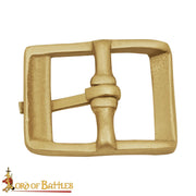 Hebilla medieval pequeña en latón macizo (3,3x2,6 cm.)