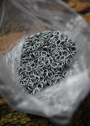 Bolsa anillas zinc cota malla, 9 mm.