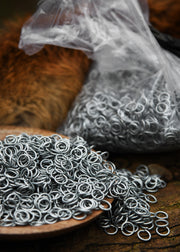 Bolsa anillas zinc cota malla, 9 mm.