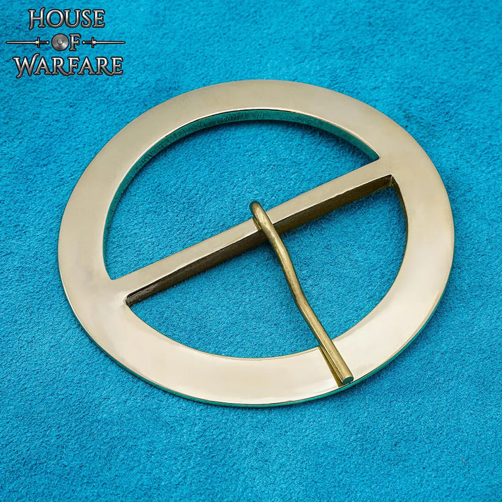 Hebilla medieval circular en latón para cinturones
