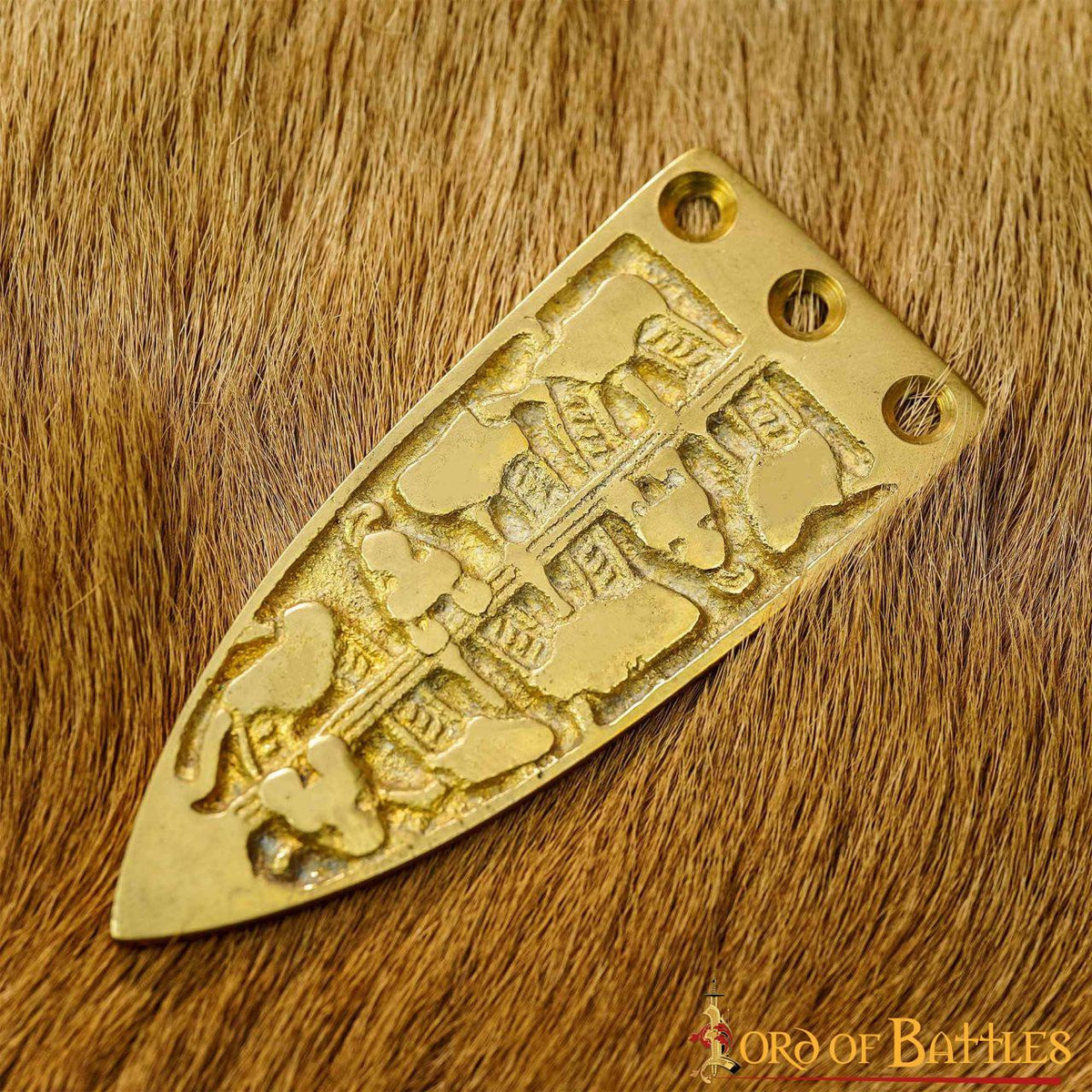 Punta decorativa de cinturón vikingo en latón