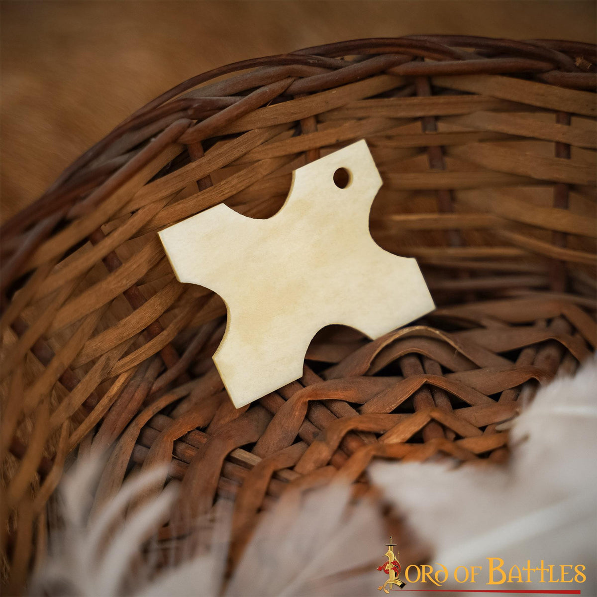 Tablita decorativa de hueso ( 3,8 x 3,1 cm)